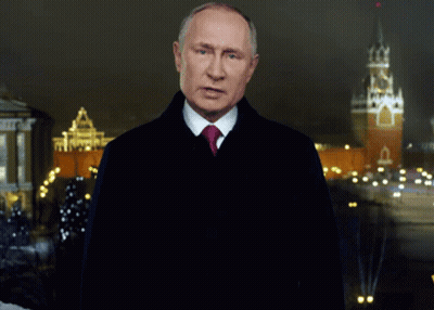 Man In Suit And Tie At Night Clock Tower GIF