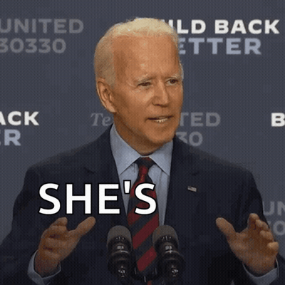 Man In Suit And Tie At Podium GIF