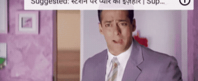 Man In Suit And Tie At Suggested Sign GIF