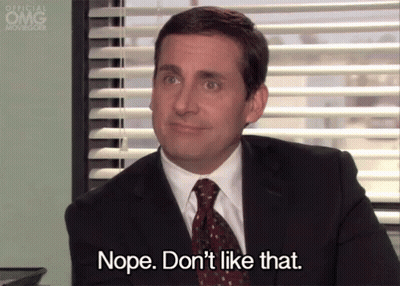 Man In Suit And Tie At Window Blinds GIF