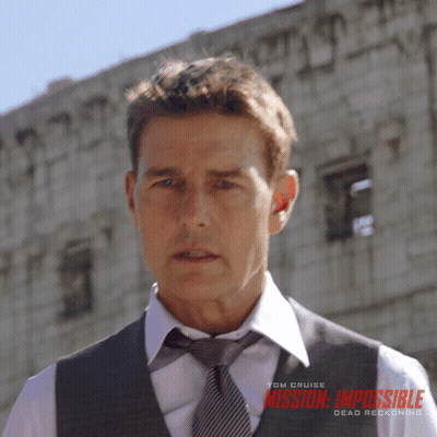 Man In Suit And Tie Before Mission Impossible Dead Reckoning Poster GIF