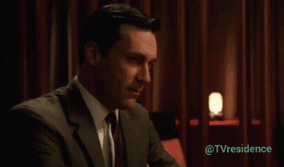 Man In Suit And Tie Before Red Curtain @Tvresidence GIF