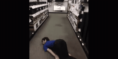 Man In Suit And Tie Before Red Curtain GIF