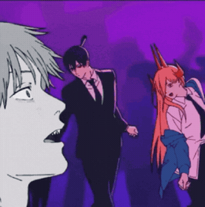 Man In Suit And Tie Beside Girl With Horns GIF