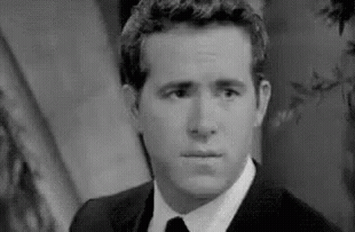 Man In Suit And Tie Black And White GIF