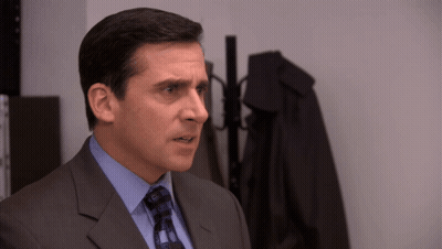 Man In Suit And Tie By Hanger GIF