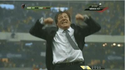 Man In Suit And Tie Celebrating At Mexico Scoreboard GIF