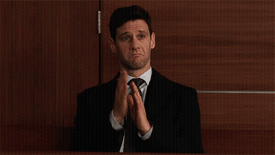 Man In Suit And Tie Clapping GIF