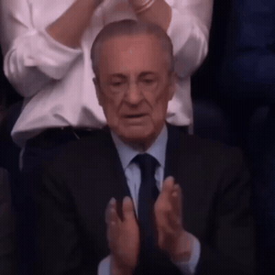 Man In Suit And Tie Clapping In Crowd GIF
