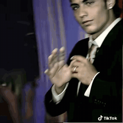 Man In Suit And Tie Clapping On TikTok GIF
