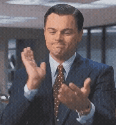Man In Suit And Tie Clapping GIF