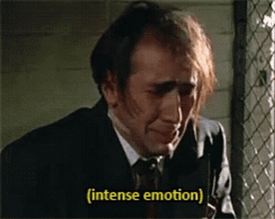 Man In Suit And Tie Crying Intensely GIF