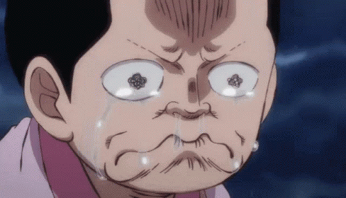 Man In Suit And Tie Crying On Couch GIF