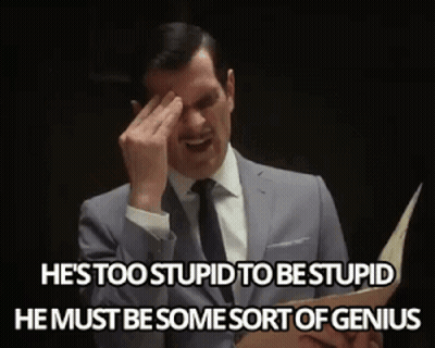Man in Suit and Tie Crying with Paper