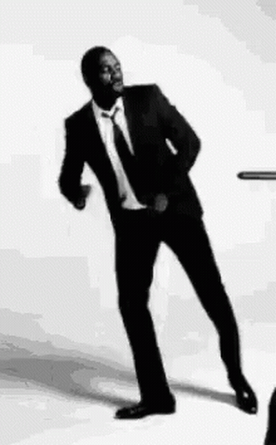 Man In Suit And Tie Dancing GIF