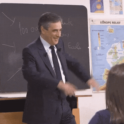 Man In Suit And Tie Dancing At Chalkboard Europe GIF