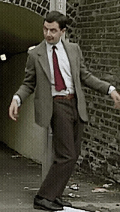 Man In Suit And Tie Dancing GIF