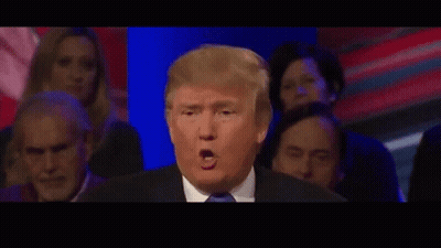 Man In Suit And Tie Dancing In Cube GIF