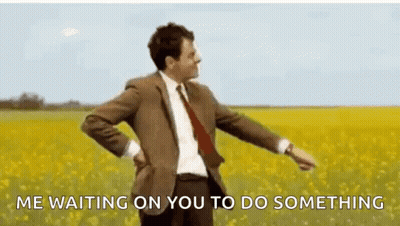 Man in Suit and Tie Dancing in Field