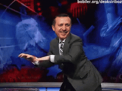 Man In Suit And Tie Dancing In Front Of Screen Saying Bobller.org/deoksiriboz GIF