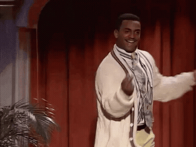 Man In Suit And Tie Dancing On Stage GIF