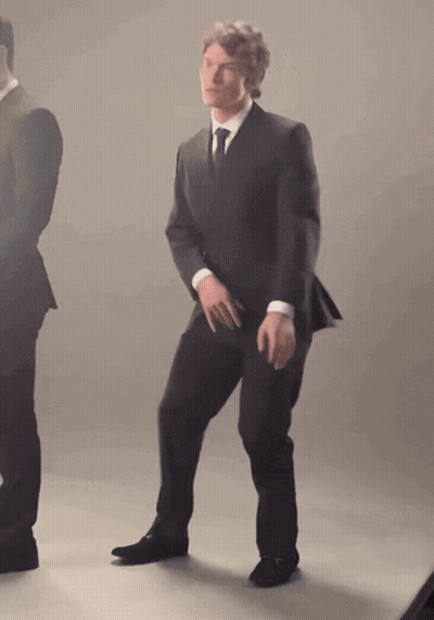 Man In Suit And Tie Dancing GIF