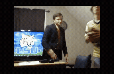 Man In Suit And Tie Dancing With LSU GIF