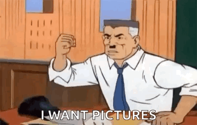 Man In Suit And Tie Fist Pumping I Want Pictures GIF