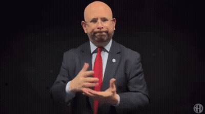 Man In Suit And Tie Gesturing GIF