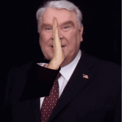 Man In Suit And Tie Giving High Five GIF