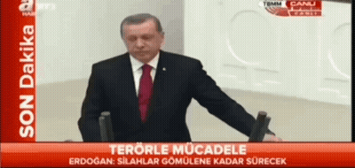 Man In Suit And Tie Giving Speech On TV GIF