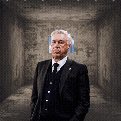 Man In Suit And Tie Hands In Pockets Dark Room GIF