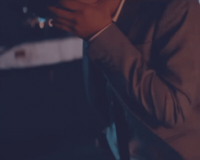 Man In Suit And Tie Holding Beer GIF
