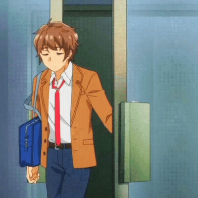 Man In Suit And Tie Holding Blue Bag GIF