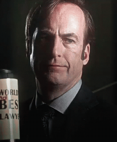 Man In Suit And Tie Holding Can Saying World No Tres GIF