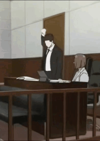 Man In Suit And Tie Holding Fist GIF