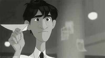 Man In Suit And Tie Holding Paper Airplane GIF