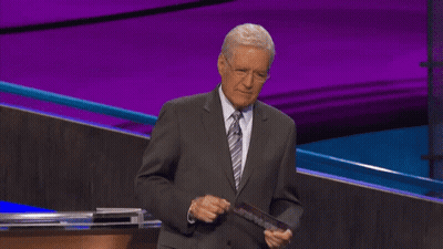 Man In Suit And Tie Holding Paper GIF