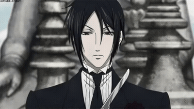 Man In Suit And Tie Holding Scissors GIF