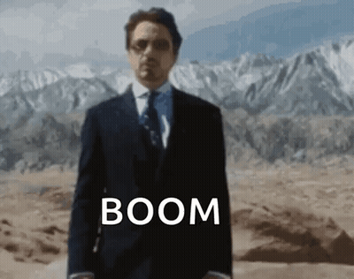 Man In Suit And Tie In Desert With Boom GIF