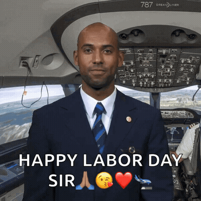 Man In Suit And Tie In Dreamliner Cockpit GIF