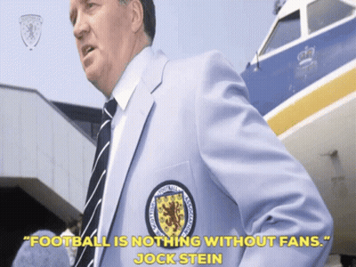Man In Suit And Tie In Front Of Airplane GIF