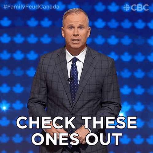 Man In Suit And Tie In Front Of Blue Background Saying Check These Ones Out GIF