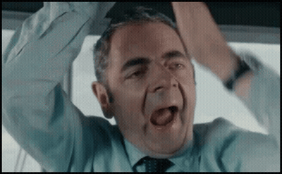 Man In Suit And Tie In Front Of Castle GIF