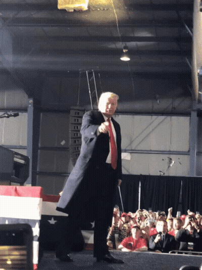 Man In Suit And Tie In Front Of Crowd GIF