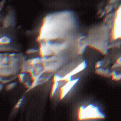 Man In Suit And Tie In Front Of Crowd GIF