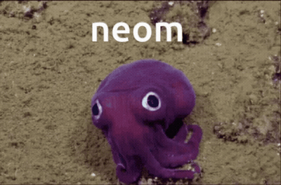 Man In Suit And Tie In Front Of For Sale Signs GIF