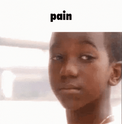 Man In Suit And Tie In Front Of Green Door GIF