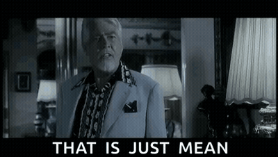 Man In Suit And Tie In Front Of Mirror GIF