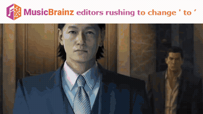 Man In Suit And Tie In Front Of Music Brainz Logo GIF
